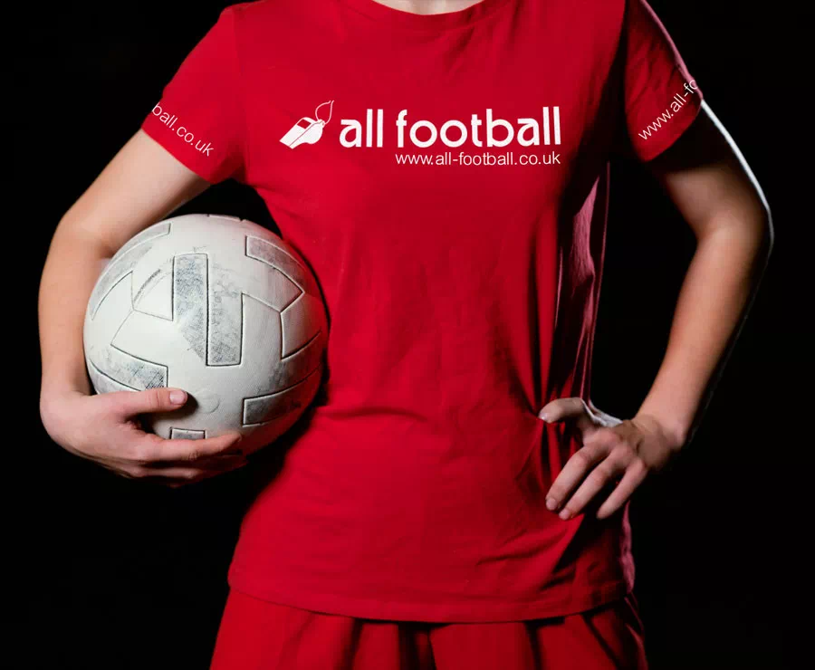 female with soccer ball branded kit
