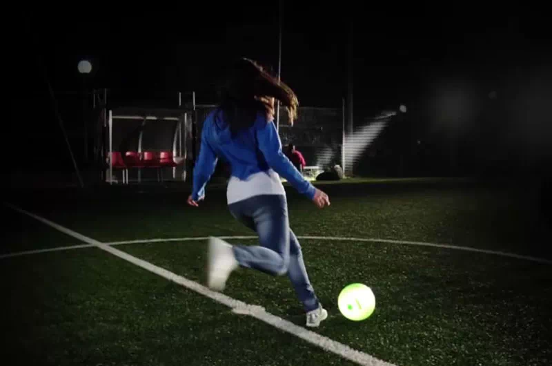 young girl kicks led nightball